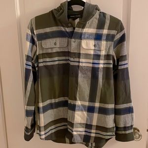 Never worn. Flannel in blue, greens and warm neutrals.  Dark grey knit hood.